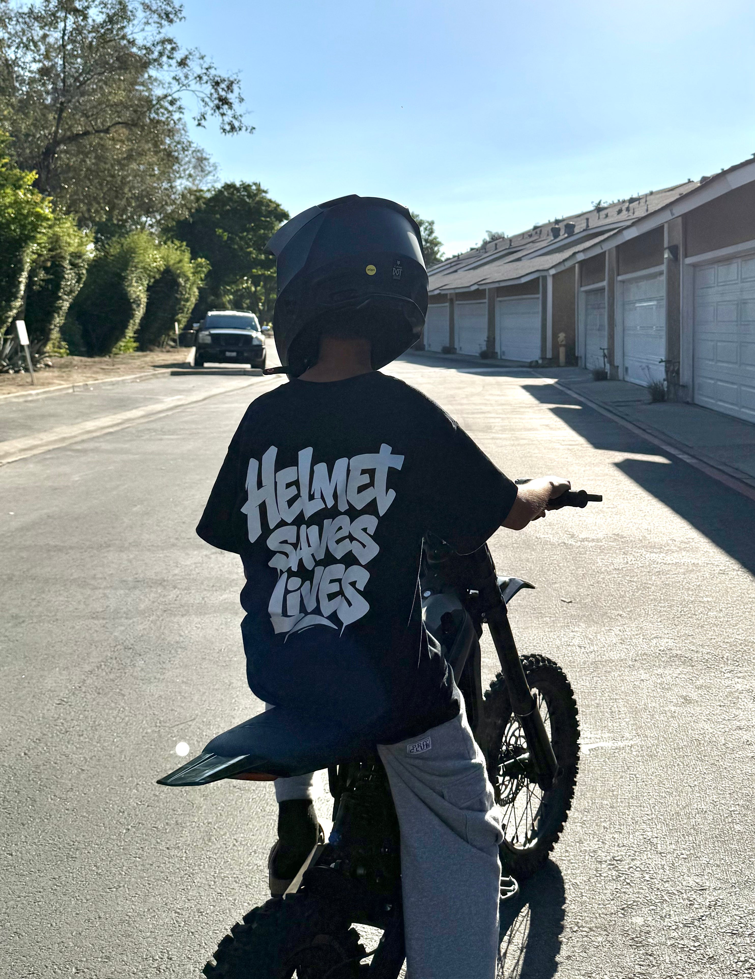 “Helmet Saves Lives” T-Shirt